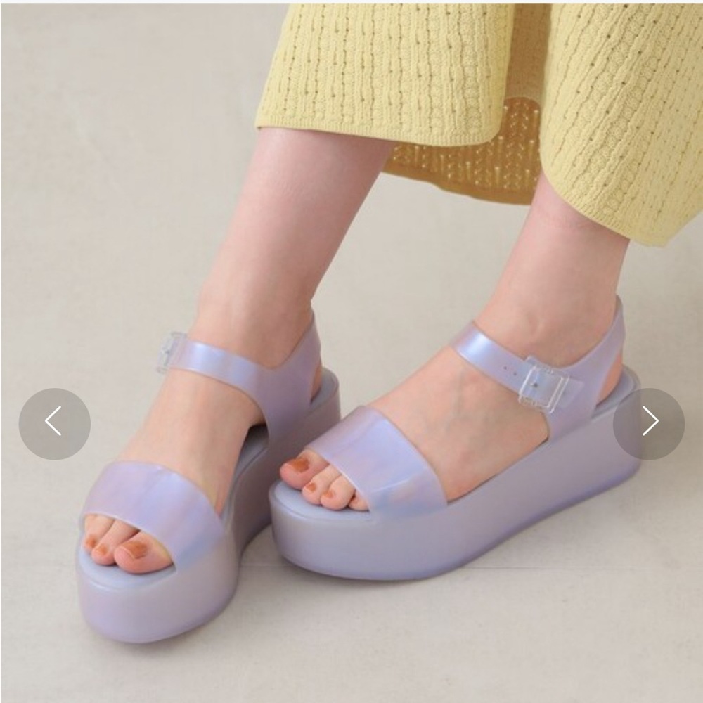 Sold Out!!!Melissa Mar Platform Sandal SIZE 6
Pearly Blue